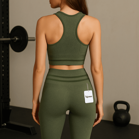 Person wearing green athletic outfit with a visible brand tag in a gym setting