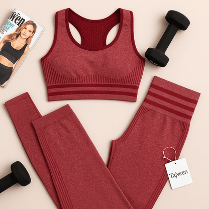 Red sports bra and leggings set with dumbbells and a magazine on a beige background